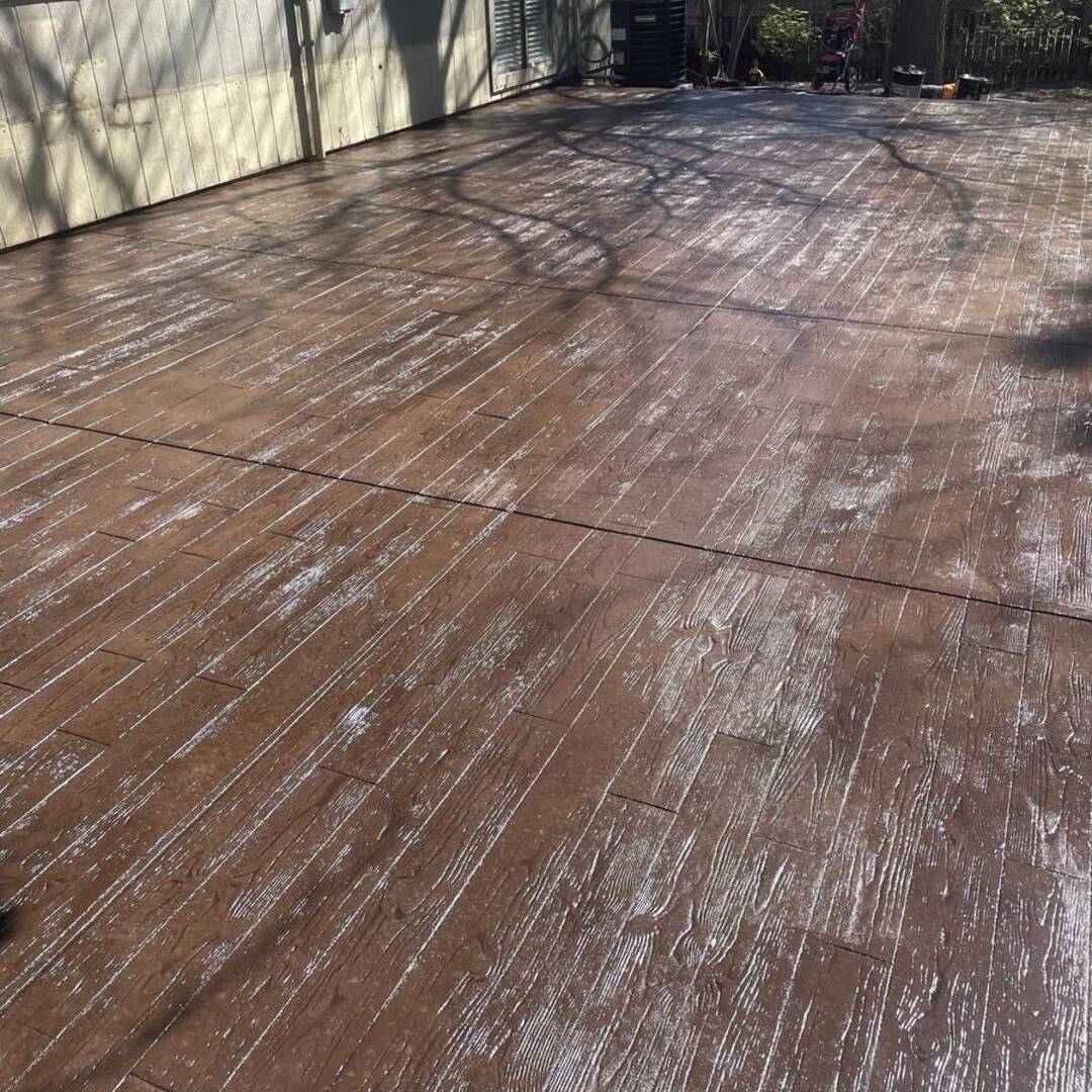 Wood-textured stamped concrete patio