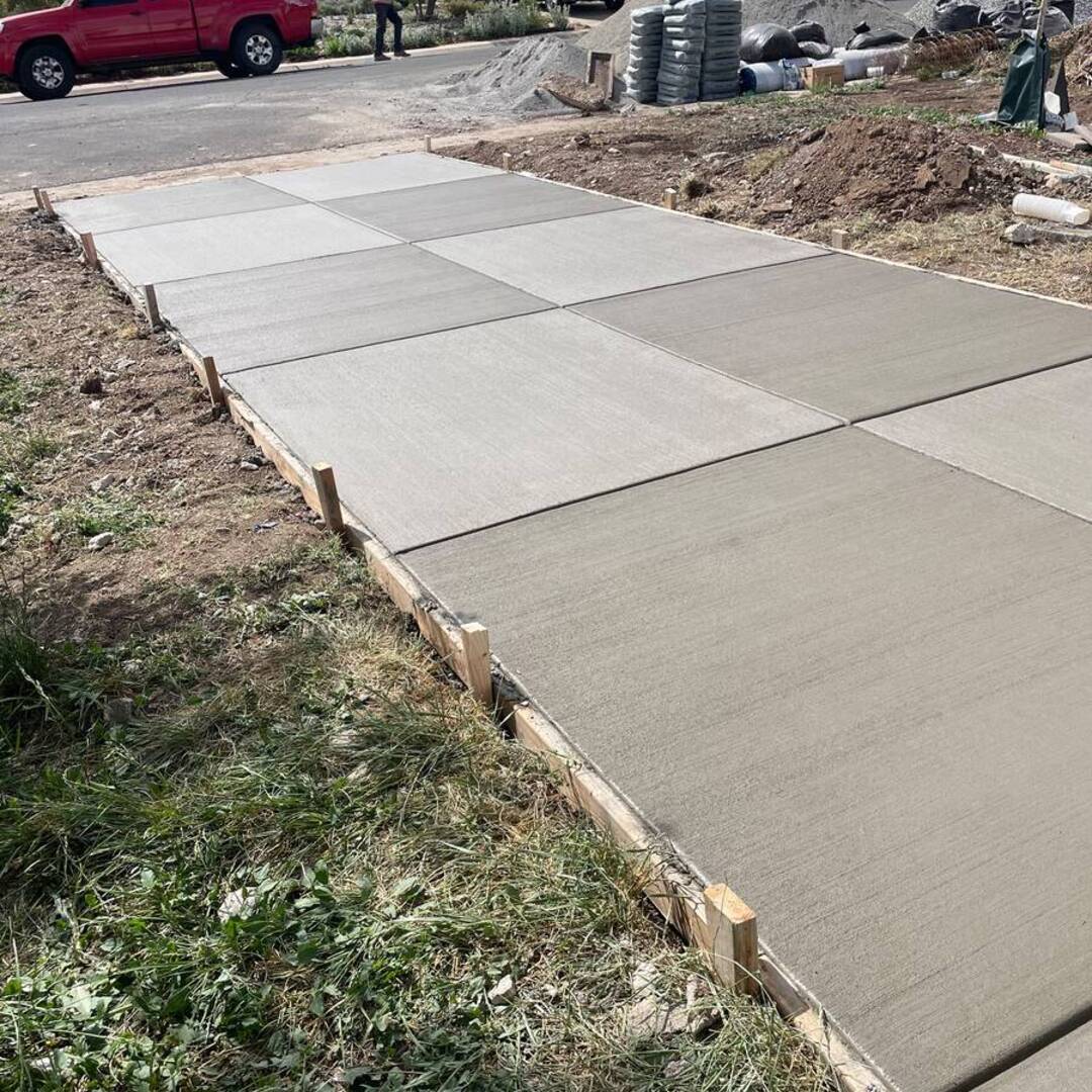 New broom-finished concrete sidewalk