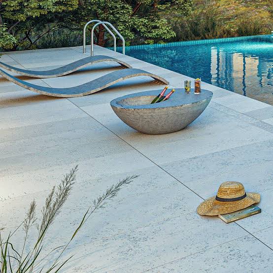 Modern concrete poolside terrace