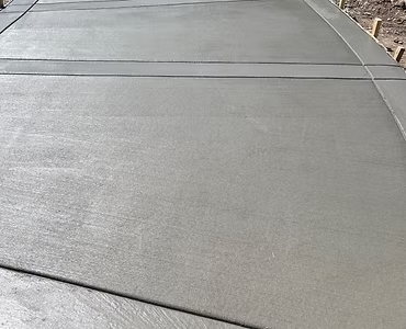 Smooth freshly finished concrete sidewalk