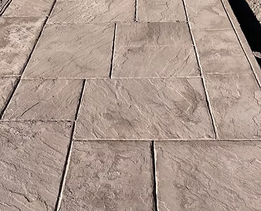 Stamped concrete patio with slate pattern