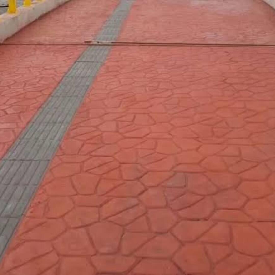Terracotta stamped concrete walkway